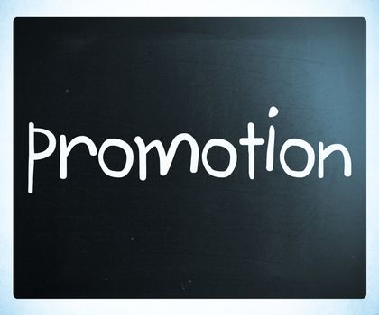 The word "promotion" handwritten with white chalk on a blackboard
