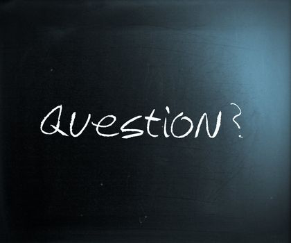 "Question" handwritten with white chalk on a blackboard.