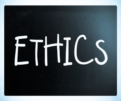 "Ethics" handwritten with white chalk on a blackboard