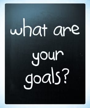 "What are your goals?" handwritten with white chalk on a blackboard