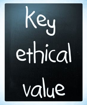 "key ethical value" handwritten with white chalk on a blackboard