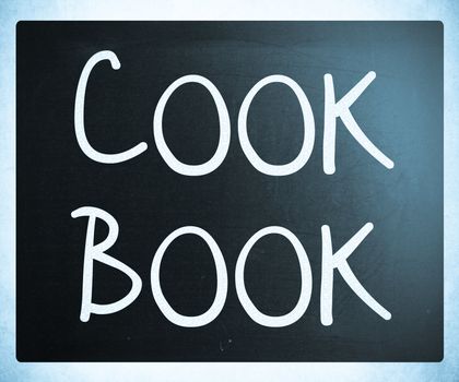 "Cook book" handwritten with white chalk on a blackboard