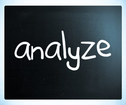 "Analyze" handwritten with white chalk on a blackboard