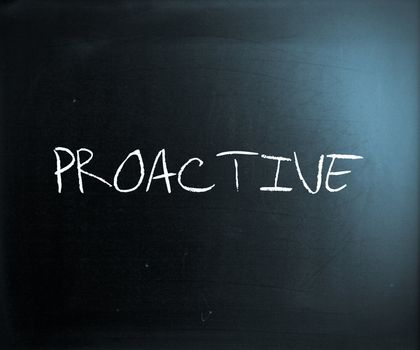 The word 'Proactive' handwritten with white chalk on a blackboard.