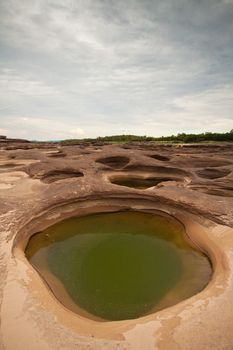 Sampanbok (3000 Hole), The Amazing of Rock in Mekong River, Ubon Ratchathani, Thailand.