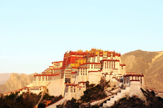 Landmark of the famous historic Potala Palace in Lhasa Tibet at sunrise
