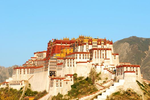 Landmark of the famous historic Potala Palace in Lhasa Tibet at sunrise