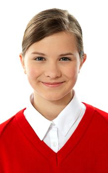 Closeup of cheerful school girl, studio shot