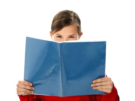 Intelligent school girl reading her study book isolated on white background