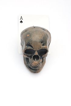 Dark skull with playing card