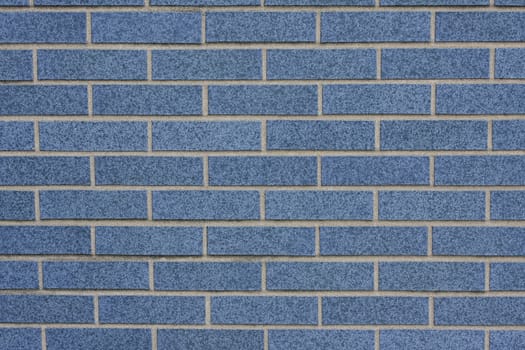 A blue brick wall background, horizontal orientation