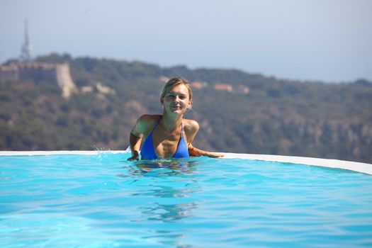 woman portrait in swimming pool