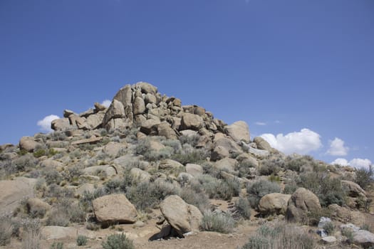 Rock boulders with a blue sky in the back ground