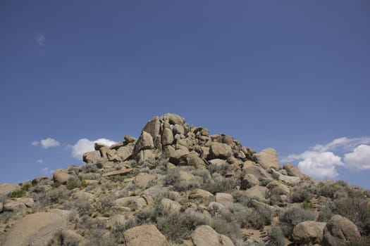 Rock boulders with a blue sky in the back ground