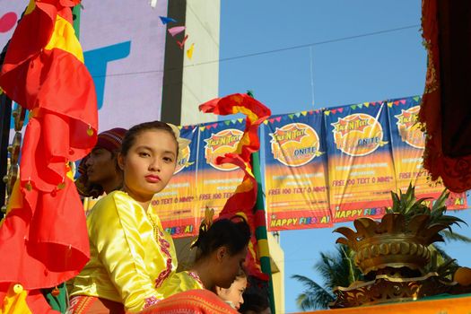 MANILA, PHILIPPINES - APR. 14: parade contestant in her cultural dress pauses during Aliwan Fiesta, which is the biggest annual national festival competition on April 14, 2012 in Manila Philippines.
