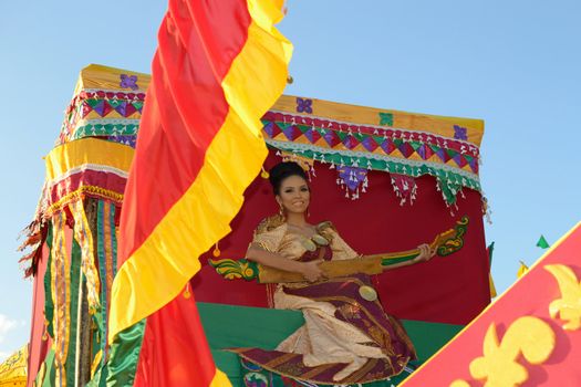 MANILA, PHILIPPINES - APR. 14: pageant contestant in her cultural dress pauses during Aliwan Fiesta, which is the biggest annual national festival competition on April 14, 2012 in Manila Philippines.