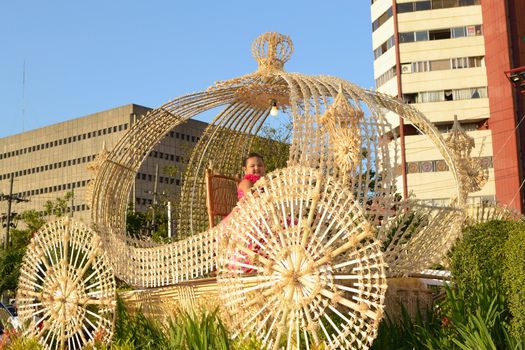 MANILA, PHILIPPINES - APR. 14: parade contestant in her cultural outfit smiles during Aliwan Fiesta, which is the biggest annual national festival competition on April 14, 2012 in Manila Philippines.