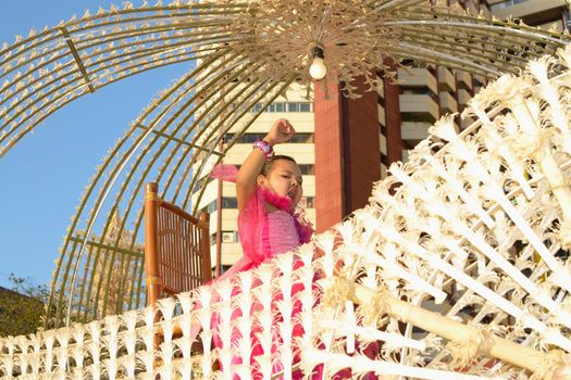 MANILA, PHILIPPINES - APR. 14: kid participant chanting in her cultural float during Aliwan Fiesta, which is the biggest annual national festival competition on April 14, 2012 in Manila Philippines.