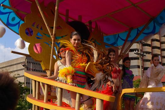 MANILA, PHILIPPINES - APR. 14: beauty contestants in their cultural dresses smiles during Aliwan Fiesta, which is the biggest national festival competition on April 14, 2012 in Manila Philippines.