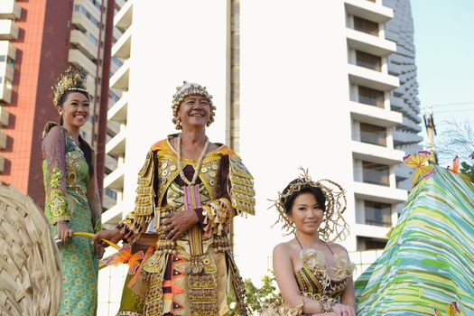 MANILA, PHILIPPINES - APR. 14: parade participants enjoying on their float during Aliwan Fiesta, which is the biggest annual national festival competition on April 14, 2012 in Manila Philippines.