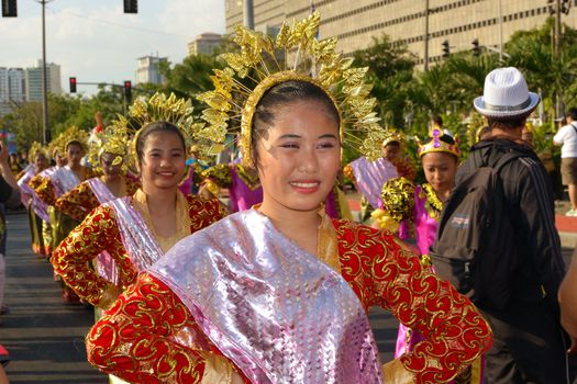 MANILA, PHILIPPINES - APR. 14: street dancers enjoying parade during Aliwan Fiesta, which is the biggest annual national festival competition on April 14, 2012 in Manila Philippines.