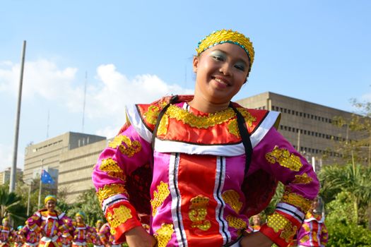 MANILA, PHILIPPINES - APR. 14: Street dancer enjoying parade during Aliwan Fiesta, which is the biggest annual national festival competition on April 14, 2012 in Manila Philippines.