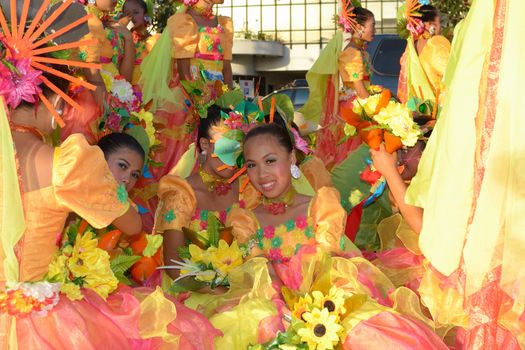 MANILA, PHILIPPINES - APR. 14: Street dancer enjoying break-time during Aliwan Fiesta, which is the biggest annual national festival competition on April 14, 2012 in Manila Philippines.