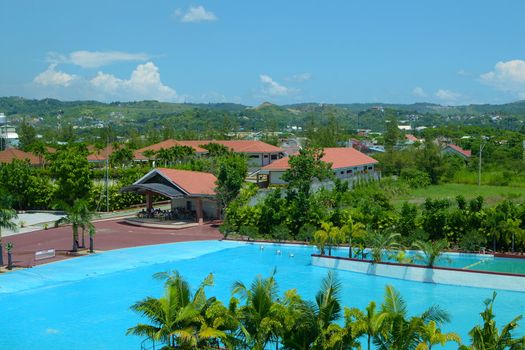 top view landscape of high-land suburb clubhouse with swimming pool.