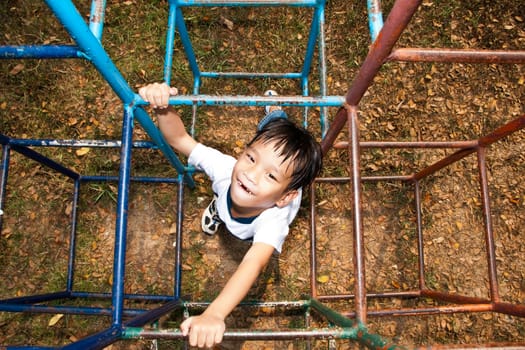 An handsome Asian kid of Thailand in Playground