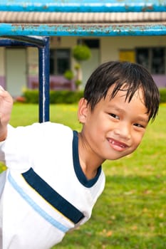 An handsome Asian kid of Thailand in Playground