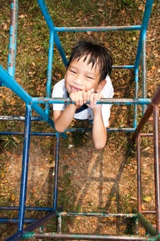 An handsome Asian kid of Thailand in Playground