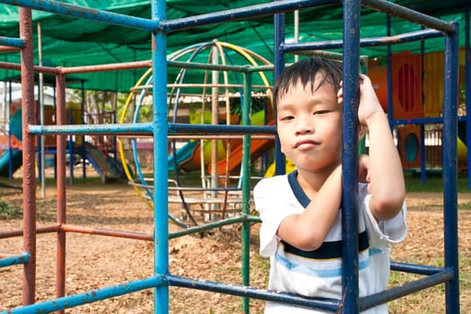 An handsome Asian kid of Thailand in Playground