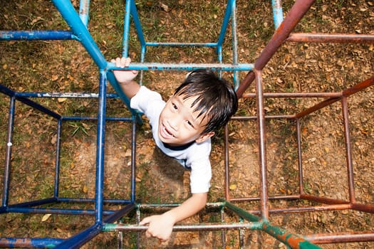 An handsome Asian kid of Thailand in Playground