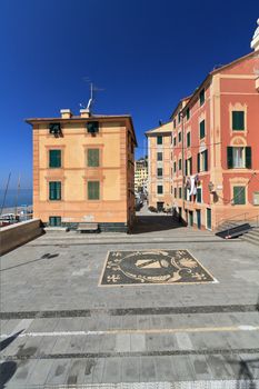 small square in Sori village, Liguria, Italy - vertical composition