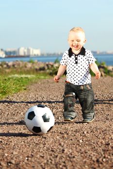  young smile boy play football