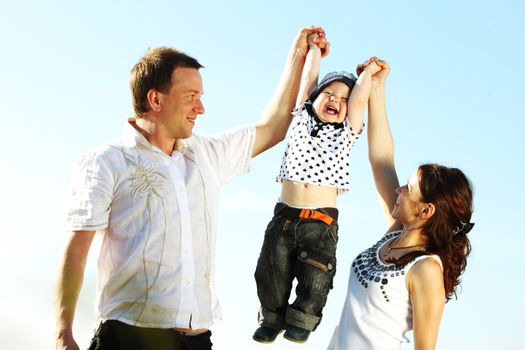 happy family on blue sky background