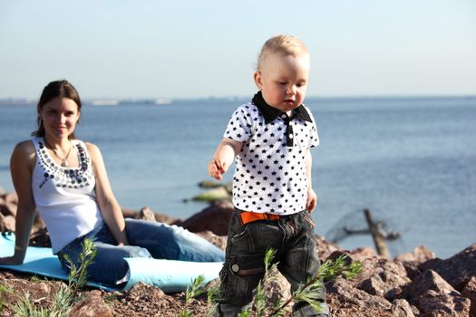 picnic of happy family near sea