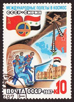 USSR - CIRCA 1987: A post stamp printed in USSR divided to international Soviet-Syrian space flights, circa 1987
