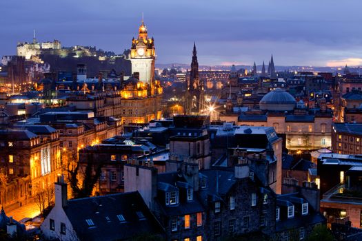 Edinburgh Cityscape and castle from Calton Hill at dusk Scotland UK