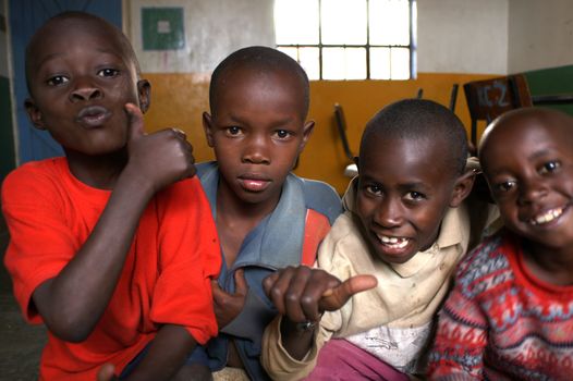 Nairobi, Kenya, March 16, 2008: group of smiling children.Father Kizito Comboni missionary work in Kenya since 1994,founder of the Koinonia community association that brings together the abandoned children of Kenya