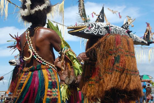 Traditional tribal dance at mask festival.
7th Gulf Mask Festival, Toare Village, Gulf Province, Papua New Guinea on June 19, 2011