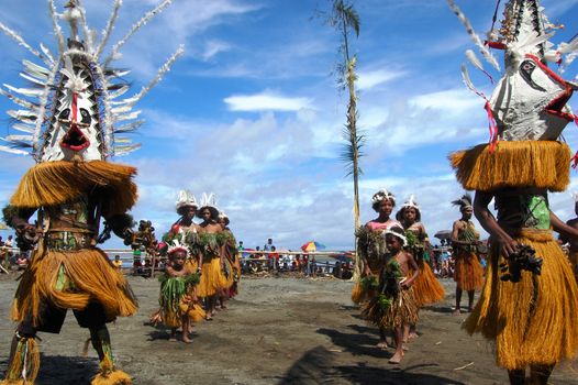 Traditional tribal dance at mask festival.
7th Gulf Mask Festival, Toare Village, Gulf Province, Papua New Guinea on June 19, 2011