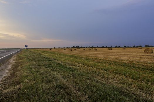 Hay, field and evening sky , Ukrain