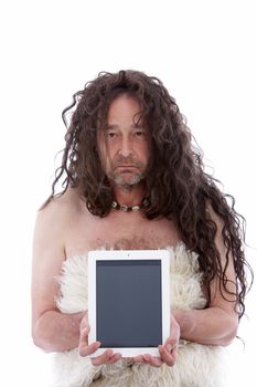 Funny long haired primitive man holding a PC tablet, portrait on white background