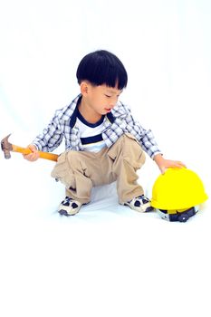 Asian Little boy with tools - isolated on white background