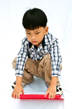 Asian little boy with blank marker board - isolated on white background