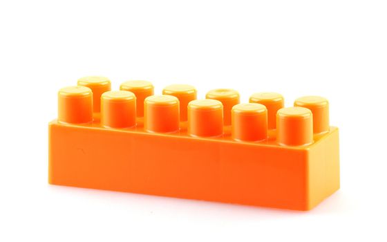 Plastic building blocks isolated on white background.