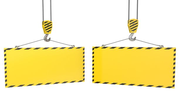 Two crane hooks with blank yellow plates, isolated on white background