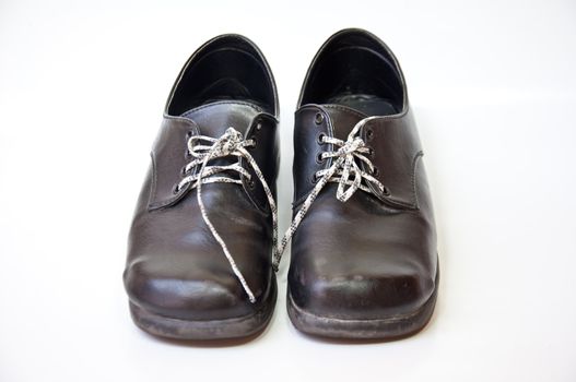 black shoe on white background