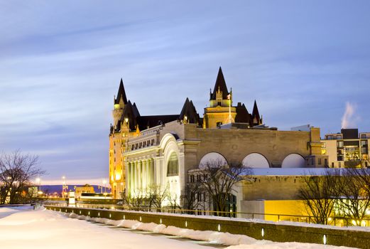 The Government Conference Centre with the Fairmont Chateau Laurier Hotel in the background in Ottawa Canada.